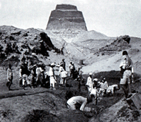 Alan Rowe and workmen pump groundwater during excavations of the valley temple at Meydum, c. 1929-32.