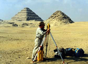 Anthropology graduate student Stephen Phillips conducting the survey of the area around Teti's pyramid.